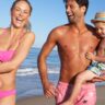 Family Having Fun On Beach